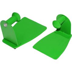 two pieces of green plastic sitting on top of each other