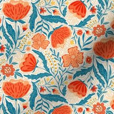 an orange and blue floral print fabric