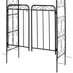 an iron garden gate with decorative designs on the top and bottom part, set against a white background