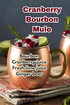 two copper mugs with cranberry bourbon mule