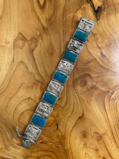 Blue Sterling Silver Engraved Bracelet, Blue Engraved Sterling Silver Bracelets, Artisan Engraved Blue Bracelets, Timberland Booties, Aztec Bracelet, Southwestern Style Blue Hand-strung Bracelet, High Potential, Unique Turquoise Nickel-free Bracelets, Bracelets Chain