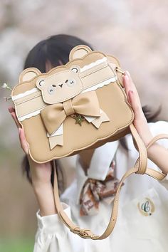 Fabric: PU Style types: Sweet Lolita Season: Spring, Summer, Autumn, Winter Include: Bag*1 (Any of the accessory is not included.) Size (IN) Length Width Height One Size 8.66 2.76 7.48 Size (CM) Length Width Height One Size 22 7 19 Cute Brown Crossbody Shoulder Bag, Cute Brown Bag With Adjustable Strap, Cute Party Pouch Shoulder Bag, Kawaii Beige Rectangular Shoulder Bag, Cute Crossbody Party Bags, Kawaii Style Shoulder Bag As Gift, Kawaii Beige Bags Perfect For Gifts, Kawaii Beige Bag As Gift, Kawaii Beige Bag For Gift