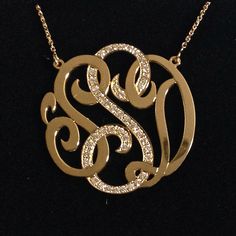 "A very special version of our medium (1.25\") monogram necklace! In this absolutely stunning necklace, the center initial is covered with beautiful F-G color, VS1-VS2 clarity diamonds. The total carat weight and count of the diamonds will vary slightly depending on which letter the center initial is. The H in the necklace pictured is covered in 82 diamonds with a weight of 0.50 ct. Also, the 14k gold plate is significantly thicker and heavier than the plate used for our traditional monograms. T Luxury 14k Gold Initial Necklace For Formal Occasions, Luxury Initials Round Pendant Jewelry, Silver Luxury Initial Necklace With Monogram, Luxury Personalized Silver Initial Necklace, Classic Diamond Initial Necklace For Anniversary, Classic Diamond Necklace With Initials For Formal Occasions, Classic Diamond Necklace With Initials For Formal Events, Luxury White Gold Monogram Jewelry, Classic Formal Diamond Necklace With Initials