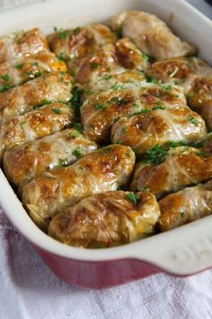 a casserole dish filled with meat and cheese