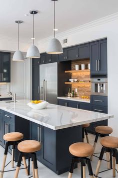 an image of a kitchen setting with stools