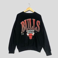 Vintage Chicago Bulls NBA Sweatshirt Easy 30 day return policy Varsity Basketball Tops With Team Logo, Throwback College Tops With Embroidered Logo, Throwback Sports Season Tops With Ribbed Cuffs, Sportswear Tops With Team Logo For Basketball, Team Name Sweatshirt For Streetwear, Throwback Logo Print Sweatshirt For Sports Season, Throwback Sweatshirt With Logo Print For Sports Season, Collegiate Crew Neck Tops For Streetwear, Throwback Crew Neck Sports Tops