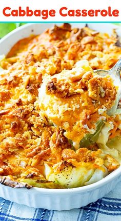 a casserole dish with cheese and vegetables in it on a blue table cloth