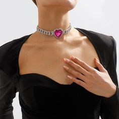 This layered silver-plated choker features a rose crystal front and center. Pendant: 1.42" W x 1.42" H Chain : 13.19" L with 4.33" extender Lobster claw clasp Silver-plated copper / crystal / cubic zirconia Crystal Clavicle Chain Jewelry For Valentine's Day, Valentine's Day Crystal Clavicle Chain Jewelry, Heart Shaped Clavicle Chain Choker For Party, Heart-shaped Clavicle Chain Choker For Parties, Rose Gold Crystal Jewelry For Valentine's Day, Valentine's Day Rose Gold Crystal Jewelry, Party Crystal Rhinestone Heart Pendant Necklace, Heart-shaped Alloy Jewelry For Party, Party Heart Pendant Alloy Jewelry