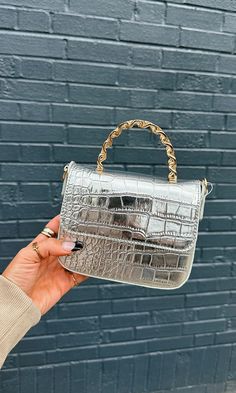 FINAL SALE, NO RETURNS It's giving GLAMOROUS - this is our two tone dream handbag!! A silver metallic croc base with a hard gold chain handle. Measurements: H12cm x W16.5cm x D6.5cm Metallic faux croc skin outer; lined interior Half-flap front closure Chain-link handle Adjustable strap Accessory Inspo, Classic Man, Handle Bag, Mens Shirt Dress, Feel Confident, Dress Shirt, Chain Link, Gold Chain, Gold Chains