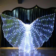 PRICES MAY VARY. Lace Performance Props: Cloak shaped wing make you like a butterfly, let you be a most eye-catching star on the stage. LED Glowing: With many LED lamp beads which has high brightness and can illuminate the entire performance area. Steps For Usage: 1. Add AA ba-tteries; 2. Set telescopic baton to desired length; 3.Place baton inside slot on both sides or veil; 4. Put neck loop around neck; 5. Press button to turn on. With Stick: The wing comes with a pair of portable telescopic s Led Wings, Lead Belly, Belly Dance Accessories, Belly Dancer Costumes, Women Dance, Dancer Costume, Led Dance, Dance Accessories, Wings Costume