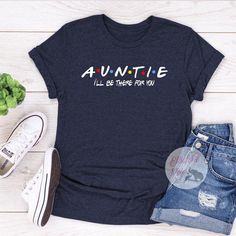 Show your love to your family with our personalized family shirts. This Auntie shirt is based off the Friends TV Show. Perfect Gift for Aunt who is a Friends addict. Choose your favorite shirt from a wide variety of unique high quality designs and colors. Blue Top With Letter Print For Family Reunion, Casual Tops With Custom Print For Family Gatherings, Casual Graphic Print Shirt For Family Gatherings, Casual Tops With Funny Text For Family Reunion, Customizable Blue Tops For Family Occasions, Blue Custom Print Tops For Family Reunion, Crew Neck Shirt With Letter Print For Family Gatherings, Funny Cotton T-shirt For Family Reunion, Customizable Blue T-shirt For Family