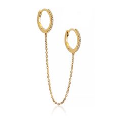 Two gorgeous diamond huggie earrings connect to a dainty chain on this unique single earring. Handcrafted with ethically sourced diamonds. 14K Gold Carat weight: 0.08ct Clarity: SI 1- 2 Hypoallergenic, lead and nickel free Inside Diameter 8mm Chain Drop Length 1.3 in (3.5cm) Snap closure #ED070 Dainty Yellow Gold Hoop Earrings With Adjustable Chain, Minimalist Huggie Earrings With Adjustable Chain, Chain Huggie Earring, Elegant Yellow Gold Cartilage Earrings With Adjustable Chain, Gift Diamond Accent Dangle Huggie Earrings, Gold Tarnish-resistant Dangle Diamond Earrings, Diamond Earrings With Adjustable Chain, Rosegold Double Chain Earrings, Diamond Huggie Earrings