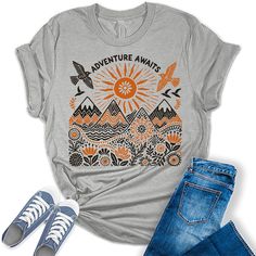 Style: Add some style to your wardrobe with our Fall vintage tees for women! These graphic tees for women are the perfect blend of style and comfort and are sure to add some fun and fashion to your attire. Quality: Our womens tops are designed and printed with love in the USA. We use high-quality inks on premium Bella Canvas Unisex vintage graphic tees for a bold and stylish look. Fabric: Crafted with a premium blend of 100% Airlume combed and ring-spun cotton, this unisex floral top is incredib Gray Graphic Print Top For Outdoor Activities, Casual T-shirt With Funny Print For Outdoor Activities, Funny Print Short Sleeve Tops For Outdoor Activities, Vintage Graphic Tees, Fall Vintage, Graphic Tees For Women, Hiking Shirt, Graphic Tees Vintage, Hiking Shirts