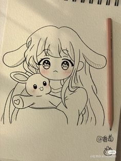 a drawing of a girl holding a baby sheep in front of her face with a pencil next to it