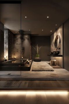 a bathroom with a large bath tub next to a walk in shower and wooden floors