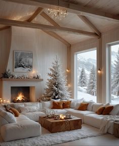 a living room filled with lots of white furniture and christmas trees in the window sill