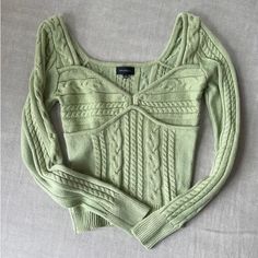 Sage Green Sweater From Majorelle, Bought Off Trr, Tried On But Never Worn. No Flaws, 100% Acrylic. Price Firm. Beautiful But No Occasion To Wear To! Fitted Knitted V-neck Top, Fitted Long Sleeve Knitted Sweater, Fitted V-neck Textured Knit Top, Fitted Cable Knit Sweater For Fall, Fitted Casual Knit Top For Winter, Green Non-stretch Tops For Winter, Trendy Fitted Winter Knit Top, Green Fitted Knit Top For Fall, Fitted Knitted Winter Tops