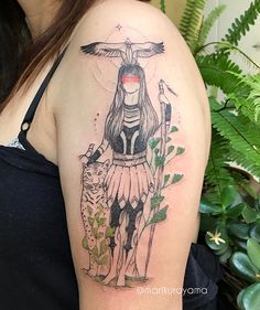 a woman with a goat tattoo on her arm