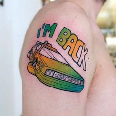 the back of a man's arm with an image of a car on it