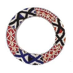 Kuba Beaded Collars represent a fusion of craftsmanship and symbolism within the artistic traditions of the Kuba people, indigenous to the Democratic Republic of the Congo. Fashioned from beads, natural fibers, and cowrie shells, these collars showcase intricate geometric patterns influenced by nature and laden with symbolic meanings. The Kuba culture boasts a storied history marked by highly developed governance systems and rich artistic traditions, including their mastery of raffia cloth made Raffia Palm, Symbolic Meanings, Democratic Republic Of The Congo, Cowrie Shells, Beaded Collar, Cowrie Shell, Trade Beads, Republic Of The Congo, Geometric Patterns