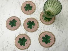 Introducing the Clover Leaf Shamrock Beaded Round Coasters - the perfect blend of elegance and Irish charm! These coasters feature a stunning clover leaf design, intricately woven with shimmering beads to create a captivating centerpiece for any tabletop. Not only do they provide a sturdy surface to rest your drink, but they also add a touch of sophistication to your decor. With their round shape and durable construction, these coasters are sure to become your new favorite way to protect your fu Centre Table, Round Coasters, Living Room And Dining Room, Green Beads, Perler Bead Patterns, Green Bead, Handmade Products, Clover Leaf, Drink Coasters