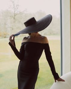 Hold on to your hats! The Nox hat is truly a statement piece. Named in homage to the Roman goddess of the night, this sensuous hat is defined by its extra large brim which is constructed from Italian straw with contrasting wool crepe on the underside.  Made to order, please allow up to 1 - 3 weeks.  If you require your Big Hat Outfit, Goddess Of The Night, Jane Taylor, Roman Goddess, Wool Crepe, Large Hats, Foto Poses