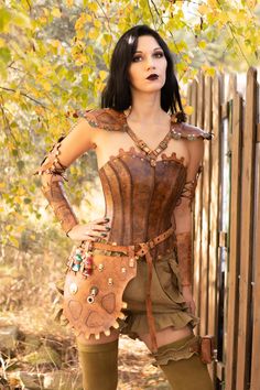 Its uniqe custom project for steampunk lover. Set include: corset, pauldrons, bracers, alchemy belt, pants with purse,  It will fit for woman with sizes XS/S bust - 78-85cm waist - 58-64cm bottom - 80-88cm Please mesure yourself before buy. Material of corset and adds: Natural hard Leather, Cattle Hide - Vegetable Tanned. Painted and etched by hand. https://www.etsy.com/shop/SteampunkAndFantasy Please read my shop policies for info on shipping, returns, and guarantees: https://www.etsy.com/shop/ Steampunk Fitted Corset For Cosplay Events, Steampunk Leather Corset Belt For Cosplay, Steampunk Overbust Corset For Cosplay Events, Brown Leather Steampunk Corset Belt, Gothic Brown Corset For Festival, Vintage Brown Corset For Larp, Steampunk Corset Belt For Cosplay, Steampunk Corset Dress For Fantasy Events, Steampunk Leather Corset Belt For Festivals