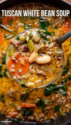 a spoon full of bean and vegetable soup with text overlay that reads tuscann white bean soup