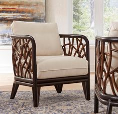 Constructed from a solid black rattan frame and rattan peel, the Panama Jack Trinidad collection has undoubtedly raised the bar for rattan furniture design. With an eye-catching pattern and rich dark finish, this lounge chair was created to turn your sunroom or living room into a conversation piece and can be combined with other pieces from the Trinidad collection to complete your living area's abstract ambiance. Cushions are included in a cotton blend fabric as shown or you may upgrade to one o Brown Lounge, Living Room Lighting Tips, Wide Armchair, British Colonial Decor, Coastal Style Decorating, Colonial Interior, Rattan Lounge Chair, British Colonial Style, Rattan Armchair