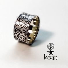 "This is a mokume gane forged ring, made of sterling silver and traditional japanese alloy shakudo (copper 95%+gold 5%). The ring width is 9,7 mm. Ready for shipping. Koan mokume gane jewellery My name is Andrew Seginovich, designer, maker and creator of Koan Mokume gane Jewelry. Welcome to my shop! The studio was created in 2005, and since that time I've been seeking the most interesting, inspiring and beautiful designs to make you happy. I hope you will enjoy my work and I promise to do my bes Hand Forged Sterling Silver Wide Band Ring As Gift, Wide Band Engraved Ring As Gift, Wide Band Engraved Ring For Gift, Wide Band Engraved Etched Ring For Gift, Mokume Gane Ring, Woodgrain Pattern, Titanium Wedding Band, Mokume Gane, Unique Ring