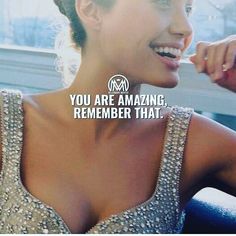 a woman smiling and wearing a dress with the words you are amazing, remember that