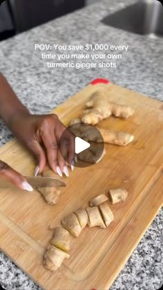 a woman cutting up food on top of a wooden cutting board