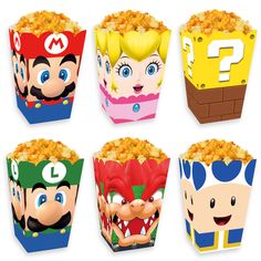 super mario bros party popcorn boxes with different faces and expressions on the front, one for each character