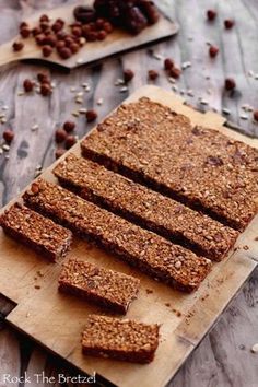 granola bars on a cutting board with raisins