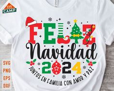 a white t - shirt with the words feli navidad and christmas decorations