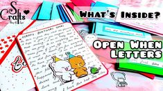 an open letter is sitting on top of some papers with writing and pictures around it