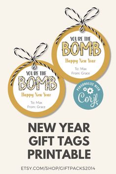 two new year gift tags with the words, you're the bomb and happy new year