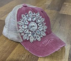 This women's baseball cap is perfect for adding some sparkle to your outfit. The cap is designed with a beautiful red & beige color scheme, featuring accents made of "bling" rhinestone that provide a touch of glamor. The cap also contains a mesh back that provides a cool and comfortable feel during summer, fall, and spring seasons. One-size-fits-all baseball cap is perfect for women who love to accessorize with style. Its features include a ponytail slot which makes it a unique and fashionable piece for any wardrobe. Adjustable Baseball Cap With Bling, Rhinestone Baseball Cap One Size, Rhinestone Embellished One Size Baseball Cap, Baseball Hat Outfits, Rhinestone Baseball Cap, Cap With Ponytail, Baseball Hat Outfit, Beige Color Scheme, Hat Outfits