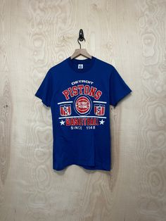 Medium 50% Cotton 50% Polyester Pit to Pit 18" Back Collar to Bottom 27" Detroit Pistons, Blue T Shirt, Blue T, Blue Tshirt, Vintage 90s, Graphic Tee, Mens T, Graphic Tees, Tee Shirts