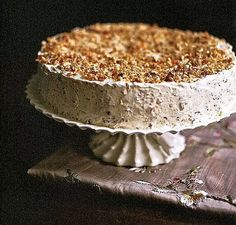 a cake sitting on top of a wooden table