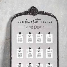 the seating chart for our favorite people is displayed in front of a white wall with black trim