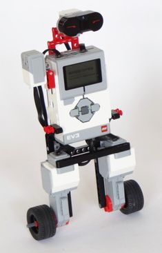 a robot that is sitting on some wheels