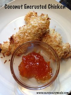 coconut encrusted chicken on a plate with ketchup