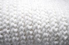 closeup of the texture of a white blanket