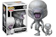 an alien with its mouth open next to a pop vinyl figure and the box for it's packaging