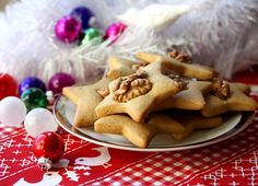 a white plate topped with cookies on top of a table