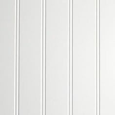 a white wall with vertical lines painted on it