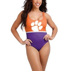 Make a statement at the beach or pool this summer with this Clemson Tigers one-piece bathing suit. This FOCO suit features an attractive design in team colors. It's the perfect option to show everyone you're a dedicated Clemson Tigers fan when spending some time in the sun.Make a statement at the beach or pool this summer with this Clemson Tigers one-piece bathing suit. This FOCO suit features an attractive design in team colors. It's the perfect option to show everyone you're a dedicated Clemso Sporty Swimwear For Sports Events In Summer, Sporty Swimwear For Summer Sports Events, Orange Sporty Swimwear For Pool, Orange Sports Swimwear For Beach Season, Orange Swimwear For Beach Season Sports, Clemson Tigers, Team Colors, At The Beach, Bathing Suit