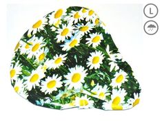 a white and yellow hat with daisies all over it's surface on a white background