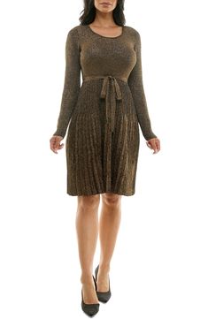 A fit-and-flare silhouette hugs your figure in a long-sleeve sweater dress with a ribbed texture and metallic shine. 39 1/2" length Scoop neck
 Long sleeves 78% rayon, 22% polyester Machine wash, tumble dry Imported Model stats: 5'10" height, 32" bust, 25" waist, 36" hip. Flare Sweater Dress, Daytime Dresses, Long Sleeve Sweater Dress, Ribbed Texture, Fit & Flare, Sleeve Sweater, Fit And Flare, Sundress, Scoop Neck